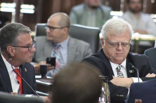From left, Sens. Charles Perry, R-Lubbock, and Paul Bettencourt, R-Houston, listen to testimony during a July 22 committee hearing. (Hannah Norton/Community Impact)