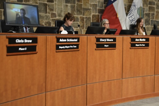 Flower Mound council members sit on the dais.