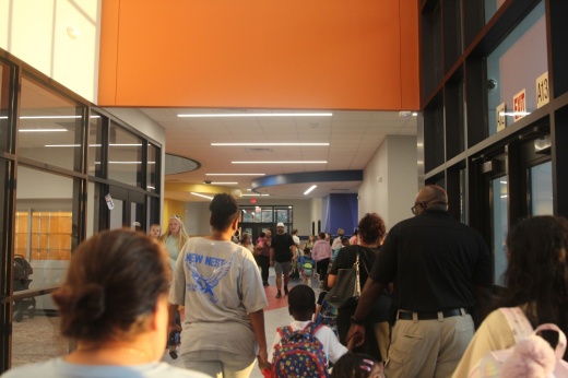 Parents join their students for the first day of the 2025-26 school year at Adelton Elementary School. (Brooke Sjoberg/Community Impact)