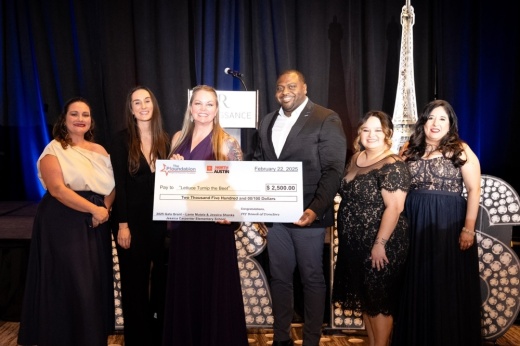 Pflugerville Education Foundation members deliver a check for grant funding to support a hands-on science project at Carpenter Elementary School. (Courtesy Pflugerville Education Foundation)