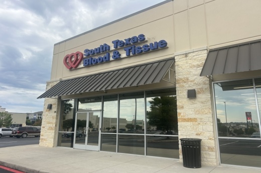 The exterior of a blood donation center is seen in Live Oak, Texas on a cloudy day.