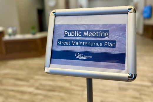 Public meeting sign