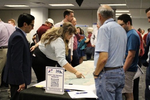 people look at a map