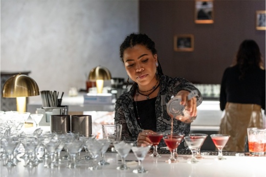 bartender mixes drinks