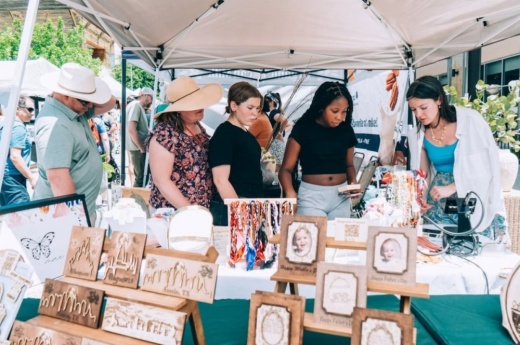 people browse products at a festival