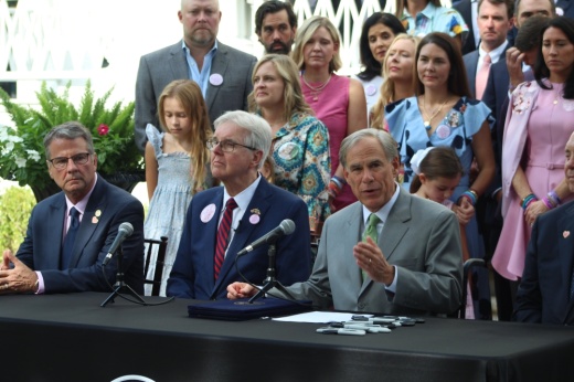 Gov. Greg Abbott speaks before signing three bills