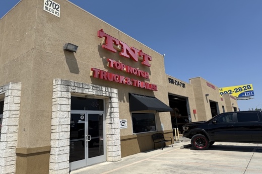 The exterior of a truck parts and repair store and garage.
