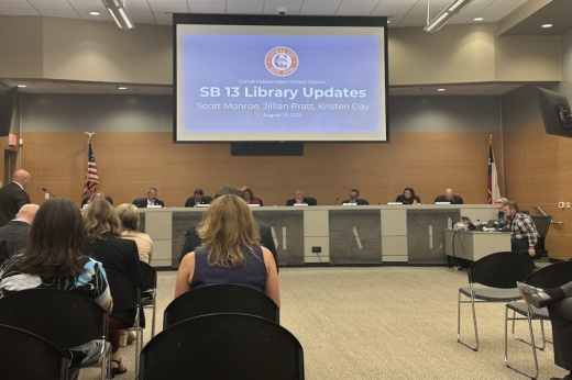people sit in a meeting room