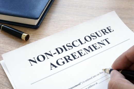 filling out a nondisclosure agreement