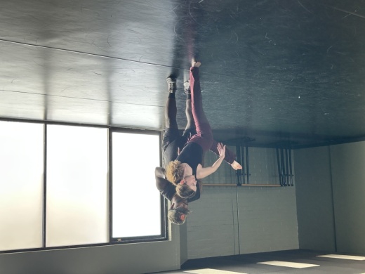 Groundworks Dance Company Owner Giovanni Allen works with a student at the company's new Richardson studio. (Karen Chaney/Community Impact)