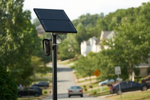 a safety camera on a solar panel pole