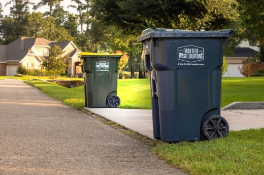 trash bins on a residential street