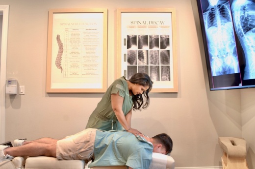 Dr. Hosein performing an adjustment
