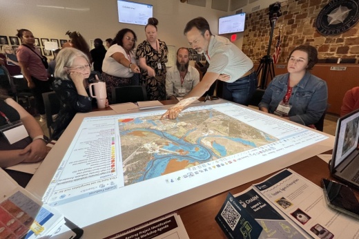 Bastrop Mayor Pro Tem John Kirkland points to a high-risk flood zone during a Project Identification Exercise that will help dictate future mitigation eefforts across the city. (Courtesy city of Bastrop)