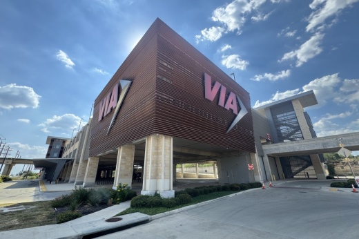 a building with a VIA logo on the side