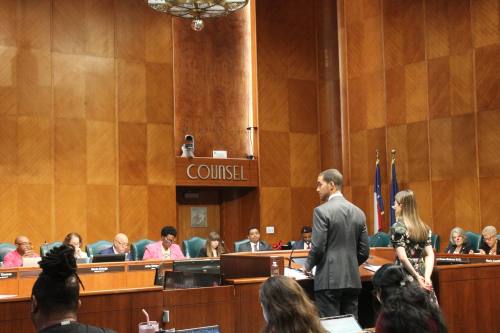 City Controller Chris Hollins (left) warns council about the city's deficit spending during an Oct. 8 city council meeting. (Sarah Brager/Community Impact)