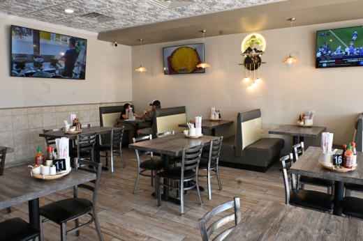 Diners eat inside Highland Pho & Grill in Highland Village.