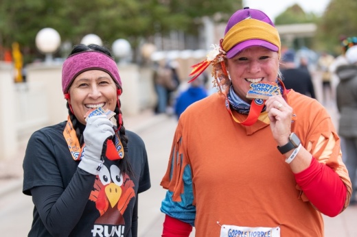 two Gobble Hobble 5K race participants