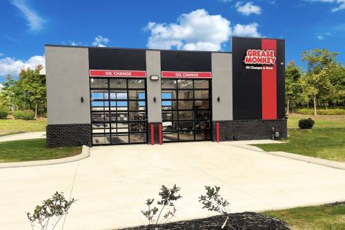 a photo of a car service business named Grease Monkey