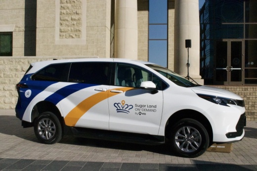 a van with a blue and yellow stripe on the side