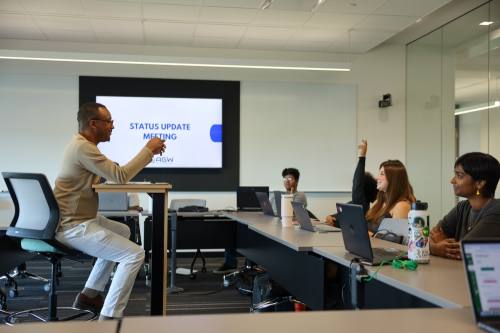 a man leads a college class