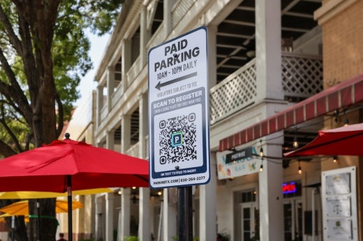 QR code on signage helps drivers register and pay for their parking sessions.