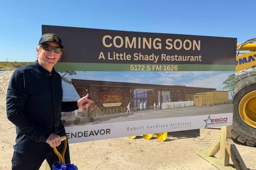 The owner is shown at a groundbreaking ceremony holding a shovel next to a "coming soon" sign for the restaurant.