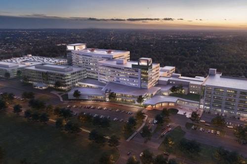 The $282.5 million expansion is centered on the addition of a new eight-story patient tower bringing additional inpatient beds, advanced imaging services and a rooftop helipad. (Rendering courtesy Memorial Hermann Health System)