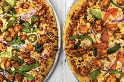Chef and Owner Naresh Lakha said customer favorites already include the Chicken Tikka, Paneer Tikka, Philly Drip and the fully loaded Overload Supreme. (Courtesy Bite Pizza Co.)