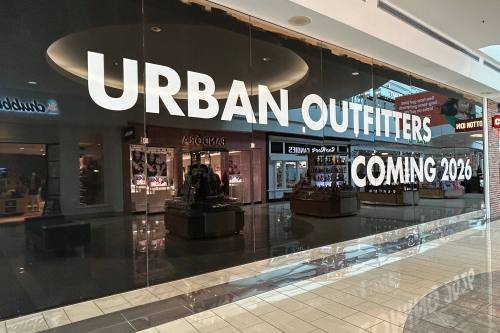 Exterior of a space in a mall featuring Urban Outfitters Coming 2026 temporary signage.