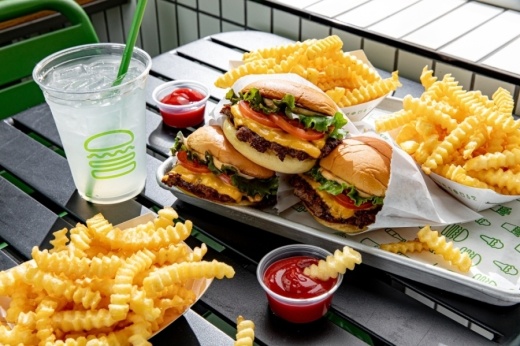 A photo of burgers and fries from Shake Shack.