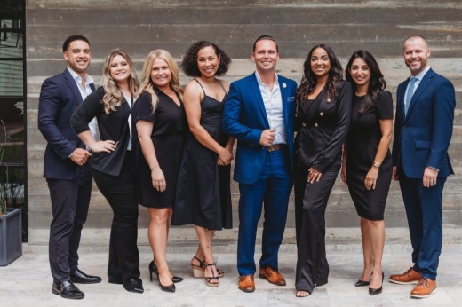 A photo of the real estate firm employees