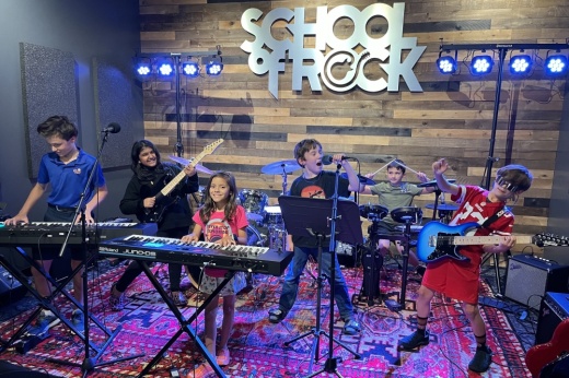 kids play musical instruments in a band