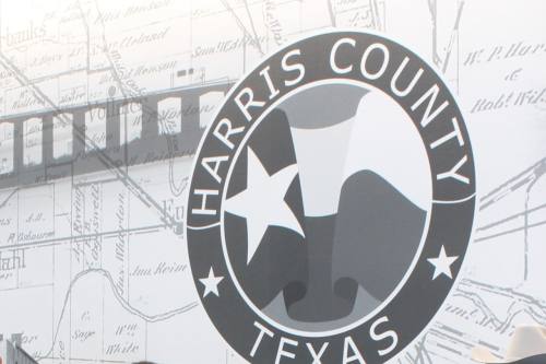 Harris County logo on a wall