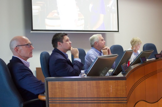 Highland Village City Council deliberates a spending item for an asphalt patching truck.