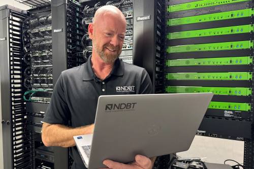 Cybersecurity expert looking at computer