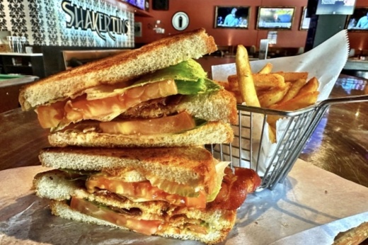 a BLT sandwich with a side of fries