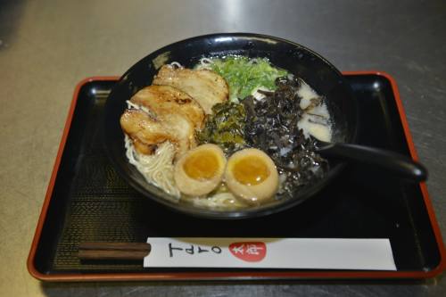 Bowl of Hokkaido ramen in Houston with creamy broth, tender noodles, fresh vegetables, and premium toppings at Taro Japanese Restaurant