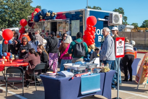 Guests line up for coffee as Horizons Coffee Bar celebrates its grand opening Oct. 30 in Bastrop. (Joel Valley/Community Impact)