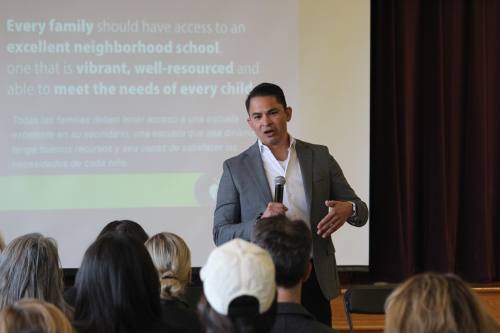 The superintendent speaks to a crowd