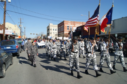 Members of the Hays County Juvenile Center Honor Guard marched Jan. 20 with more than 100 people at a celebration honoring Martin Luther King Jr. and the civil rights movement. The march started at the Hays County Courthouse and stopped at the intersection of Lyndon B. Johnson and Martin Luther King drives.
