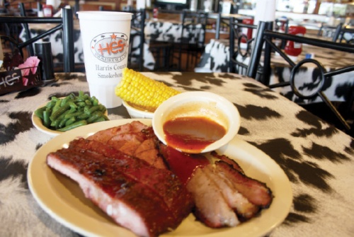 Harris County Smokehouse is most known for its barbecue plates with ribs, sausage and brisket.