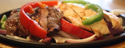 The combo fajitas ($11.99) features beef, chicken and tortillas.