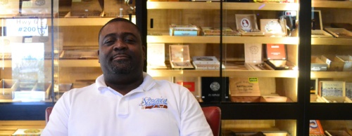Owner John Simmons opened his business to provide a lounge for customers to buy cigars.