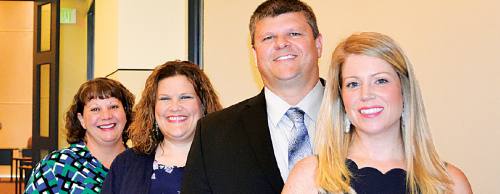 From left: Gina Mitchell, director of operations and finance, Courtney Galle, director of program development, Scott Harper, president and Samantha Good, director of membership development.