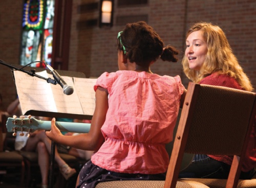 Kids in a New Groove mentors children through one-on-one music lessons.