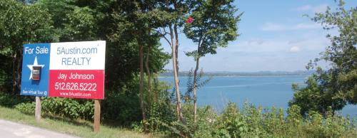 This waterfront property in the Marshall Ford area of western Travis County features expansive views of Lake Travis.