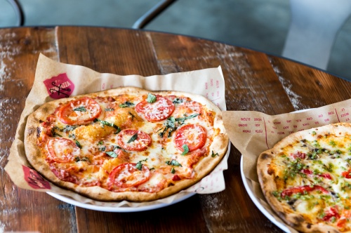 MOD Pizza's menu features customizable pizzas and salads with 30 available toppings.