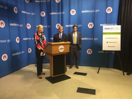 Council Member Ann Kitchen, Mayor Steve Adler and Glasshouse Policy Director Thomas Visco unveil Mobility ATX report findings.