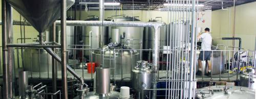 Adelbertu2019s Brewery founder Scott Hovey produces Belgian-style and barrel-aged beers at his brewery on Rutland Drive.